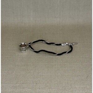 Delicate Silver And Black Cord Bracelet With Toggle Clasp with teacup cup charm